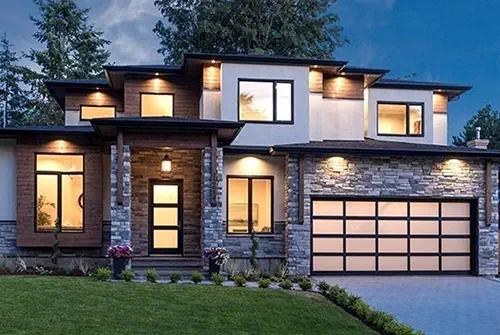 casement macfarlane A large home with dark framed casement windows, showcasing the luxury and contemporary style from MAcFarlane windows and doors.