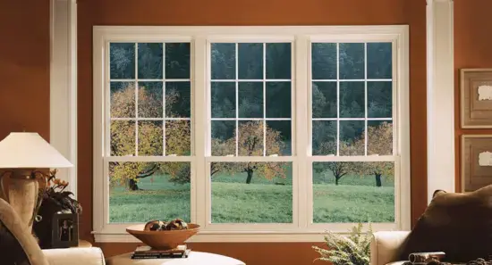 double hung mac windows (1) Interior shot of three double hung windows in a modern living room setting. Macfarlan windows and doors hung window installation.