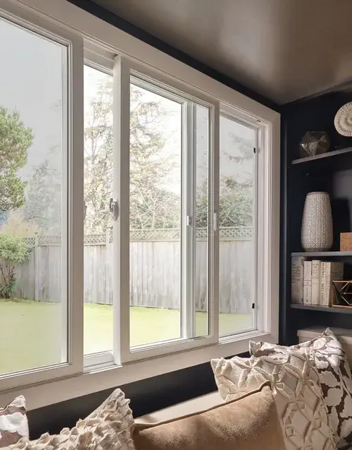 slider mac two Slider windows, in a living room setting, showcasing the installations from MacFarlane Windows and Doors.