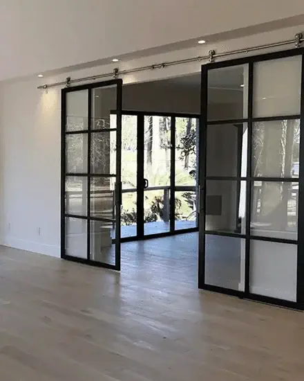 sliding inside patio doors macfarlane (1) Inside sliding barn style patio doors from MacFarlane Windows and Doors installation.